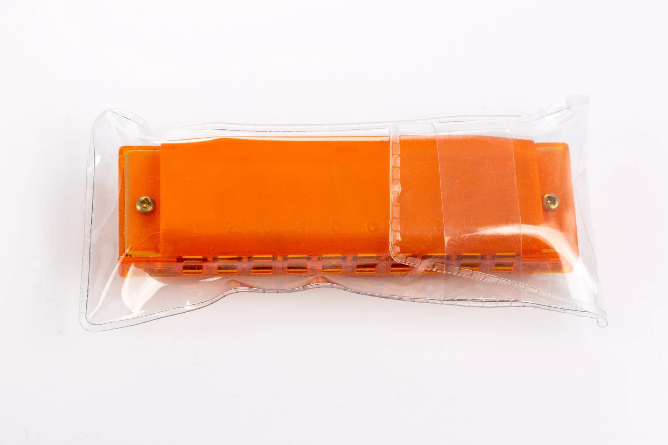 ARMONICA HOHNER TRASLUCENT HARP ORANGE EN C 4